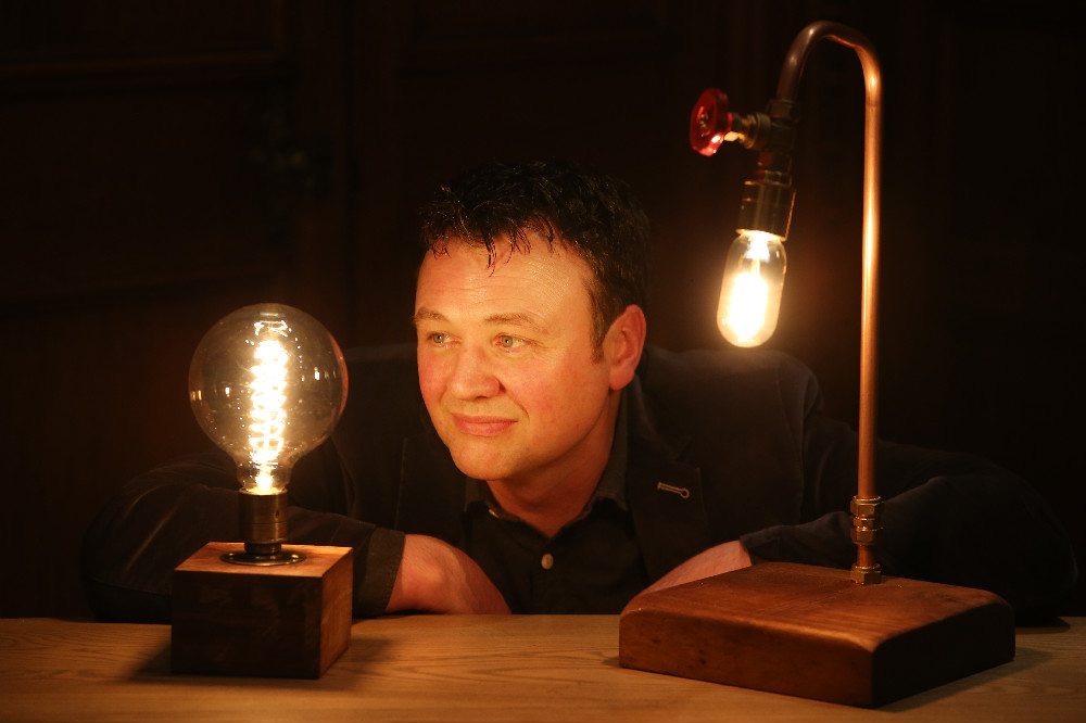Eoin Shanley of Copper Fish Studio, having a light bulb moment at the launch of the Local Enterprise Office Showcase Award. Eoin uses locally sourced natural and upcycled materials to create unique, stylish and distinctive lamps and lighting at his Studios in Delgany.